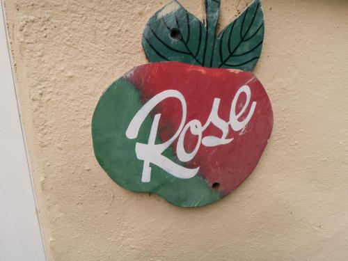 a painting of an apple on the side of a wall at Rose in Filey