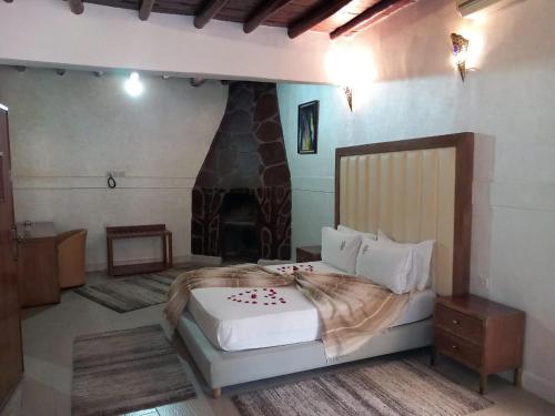 Postel nebo postele na pokoji v ubytování Auberge kasbah tifirte