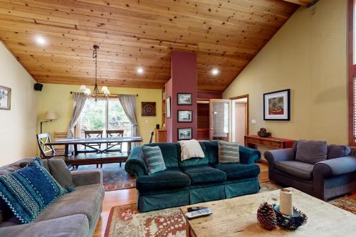 a large living room with couches and a table at Silverado Escape in Tahoe City