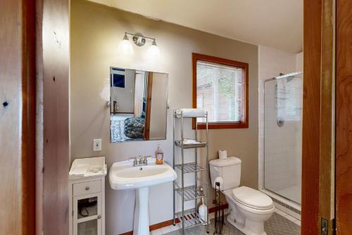 a bathroom with a white sink and a toilet at Silverado Escape in Tahoe City