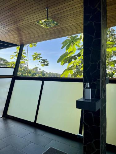 a view from the lobby of a house with glass windows at Southern Drake Lodge in Drake
