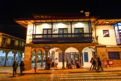 a group of people standing in front of a building at Hotel Plaza de Armas Cusco in Cusco