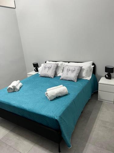 Ένα ή περισσότερα κρεβάτια σε δωμάτιο στο casa vacanza I 4 diamanti room 2