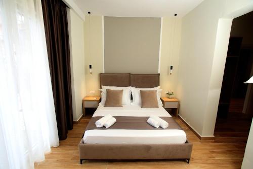 Postel nebo postele na pokoji v ubytování Hotel Villa ATA