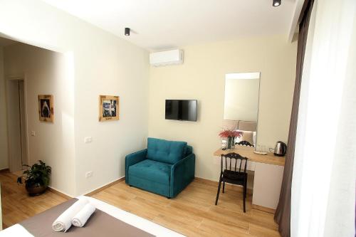 TV a/nebo společenská místnost v ubytování Hotel Villa ATA