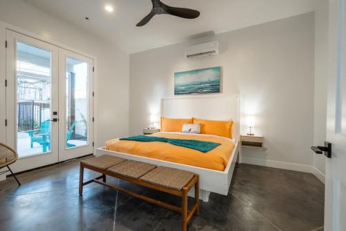 a bedroom with a bed and a ceiling fan at Just Beachy at Sand Hollow in Hurricane