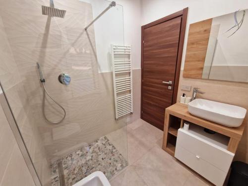 Koupelna v ubytování Appartamento Ombra
