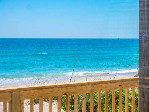 a view of the beach from a deck at Lungomare in Surf City
