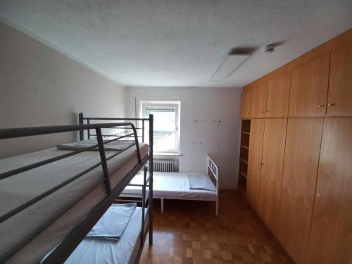 Letto o letti in una camera di Pension Trudering