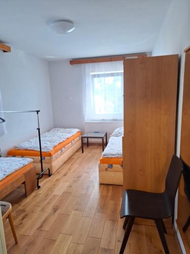 Postel nebo postele na pokoji v ubytování Apartmán U jelena