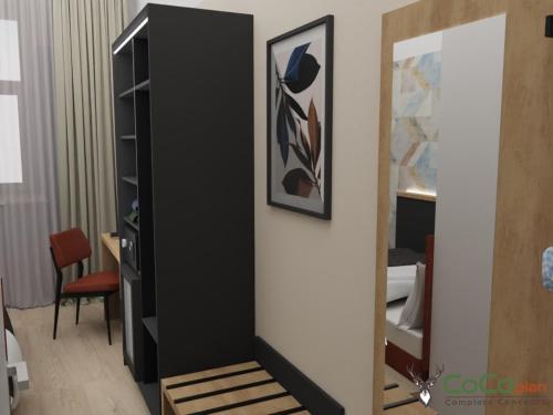 a black cabinet in a room with a mirror at NEU - Sona Design Rooms - CITY CENTER - in Bamberg