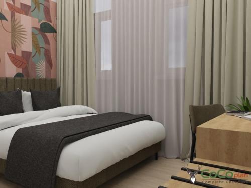 a bedroom with a bed and a desk and curtains at NEU - Sona Design Rooms - CITY CENTER - in Bamberg