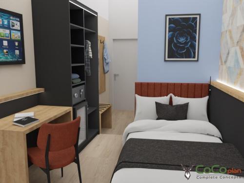a bedroom with a bed and a desk and a bed and a table at NEU - Sona Design Rooms - CITY CENTER - in Bamberg