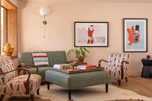 a living room with a couch and chairs at River Lodge Paso - 21 & Over Pool in Paso Robles