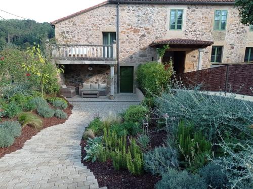 Κήπος έξω από το CASA CON ENCANTO (o Refuxio)