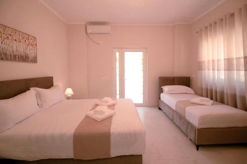 Postel nebo postele na pokoji v ubytování Gusto di Casa Rooms