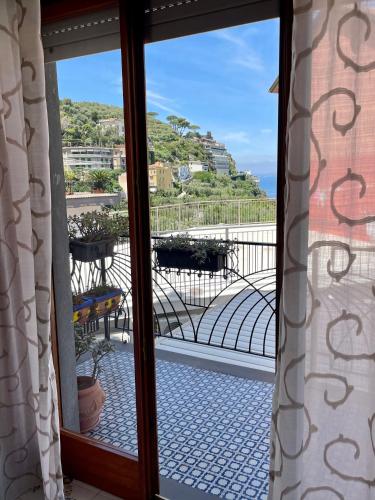 a view of the ocean from a window at CapoTen in Sorrento