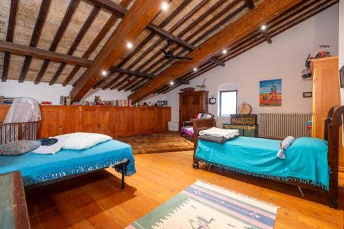 Кровать или кровати в номере Casa dei Camini