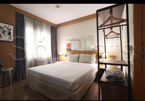 Un pat sau paturi într-o cameră la Tatuapé flat services, ótima localização