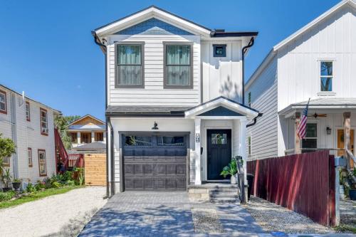 a white house with a garage at Lincolnville Nook in St. Augustine
