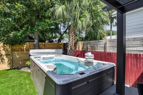 a hot tub in the backyard of a house at Lincolnville Nook in St. Augustine