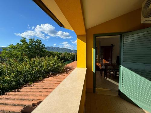 a view of a house with a door and a patio at La casa di Glenda ospedale in Terni