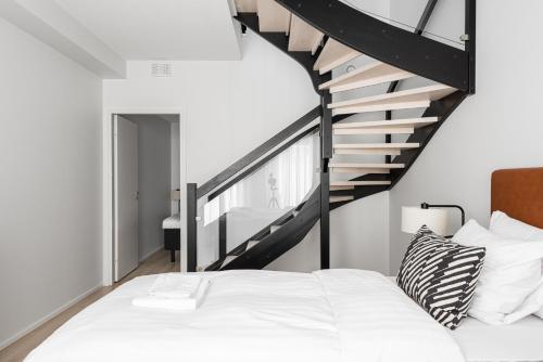 En eller flere senge i et værelse på Borg Loft City Central