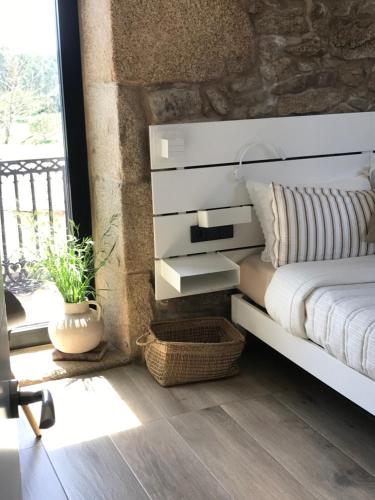 Ένα ή περισσότερα κρεβάτια σε δωμάτιο στο Casa Nicolás