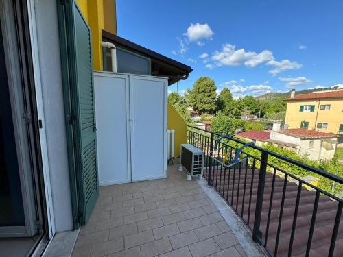 an open door on a balcony with a view at La casa di Glenda ospedale in Terni