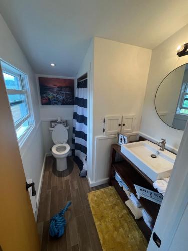 a bathroom with a sink and a toilet at PoppyJoe's in Twillingate