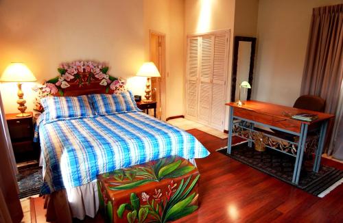 Säng eller sängar i ett rum på Hotel Portal del Angel