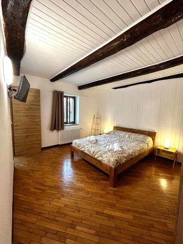 a bedroom with a bed in a room at Casa9cento in Omegna