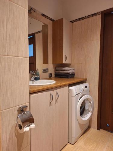 Кухня или мини-кухня в Turkusowa Apartament

