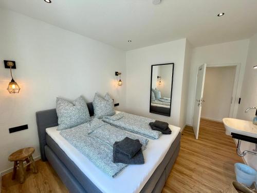Postel nebo postele na pokoji v ubytování Ferienhaus Fritz Norderney