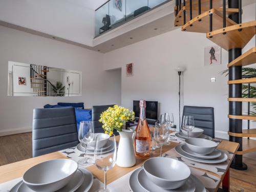 a dining room with a wooden table and chairs at Contractor-Friendly 2Bed Nr Sunderland Hospital in Sunderland