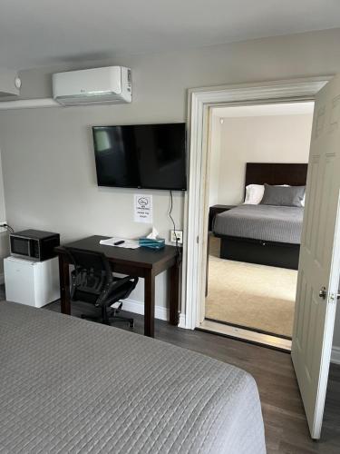 Postel nebo postele na pokoji v ubytování Miracle Motel
