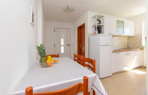 Η κουζίνα ή μικρή κουζίνα στο Apartments Adriatic Blue with pool