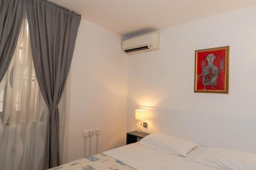 Letto o letti in una camera di Hotel Paquito