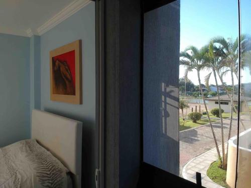 Postel nebo postele na pokoji v ubytování Condomínio Resort Ilhas do Caribe