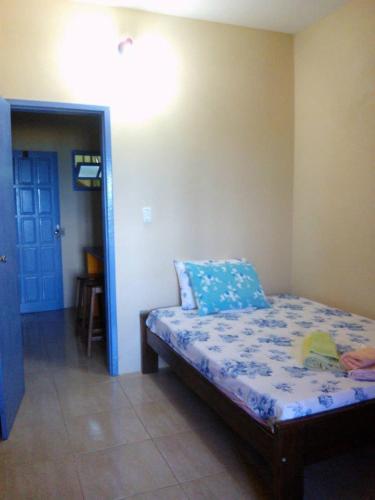 Katil atau katil-katil dalam bilik di Apartamentos da Coló