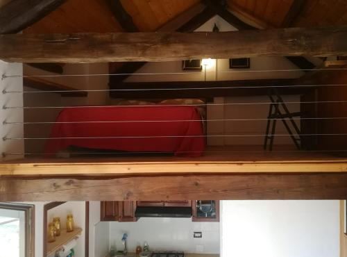 Μία ή περισσότερες κουκέτες σε δωμάτιο στο Cascina Risotto
