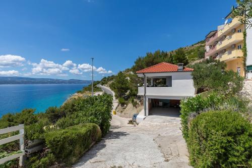 Apartments by the sea Lokva Rogoznica, Omis - 23105