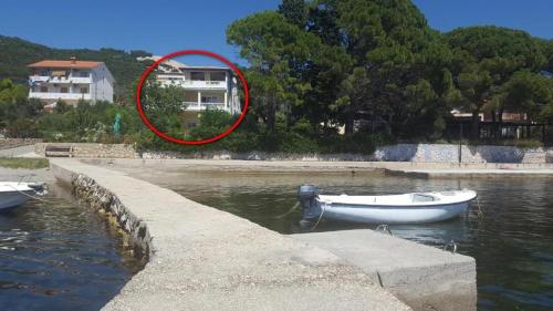 Apartments by the sea Banjol, Rab - 23210