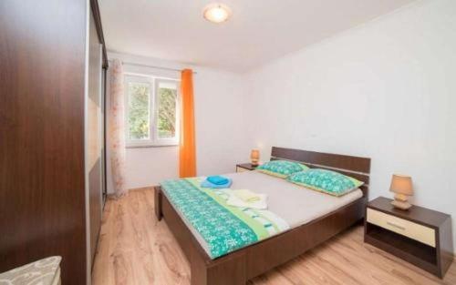 Apartments by the sea Banjol, Rab - 23210