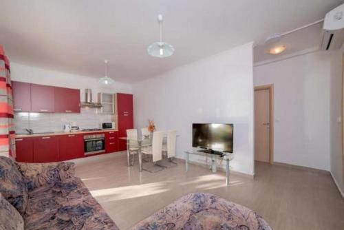 Apartments by the sea Banjol, Rab - 23210