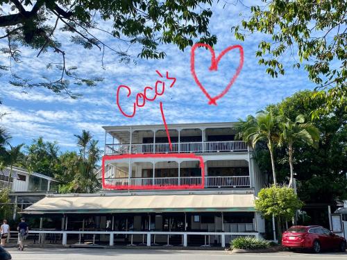 a building with a heart painted on top of it at Coco's - in town {Ultima Collection} in Port Douglas