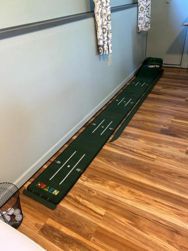a race track on the floor of a gym at LAKEFRONT PARADISE 4 bedroom Home w direct lake access, Pets OK in Traverse City