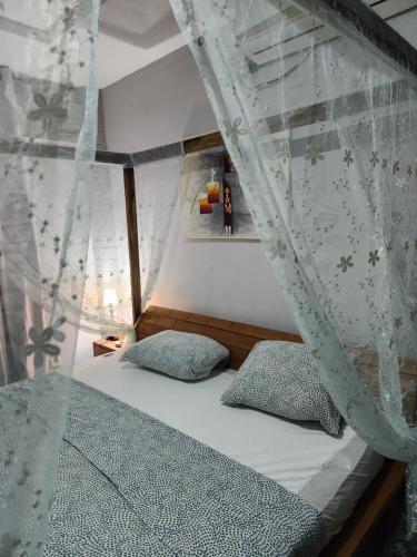 En eller flere senge i et værelse på La cachette