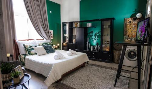 Ένα ή περισσότερα κρεβάτια σε δωμάτιο στο Cozy studio Anastasia