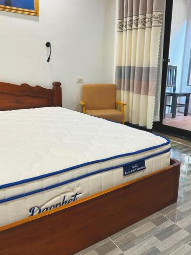 Luang Prabang Oudomlith Villa & Travelにあるベッド